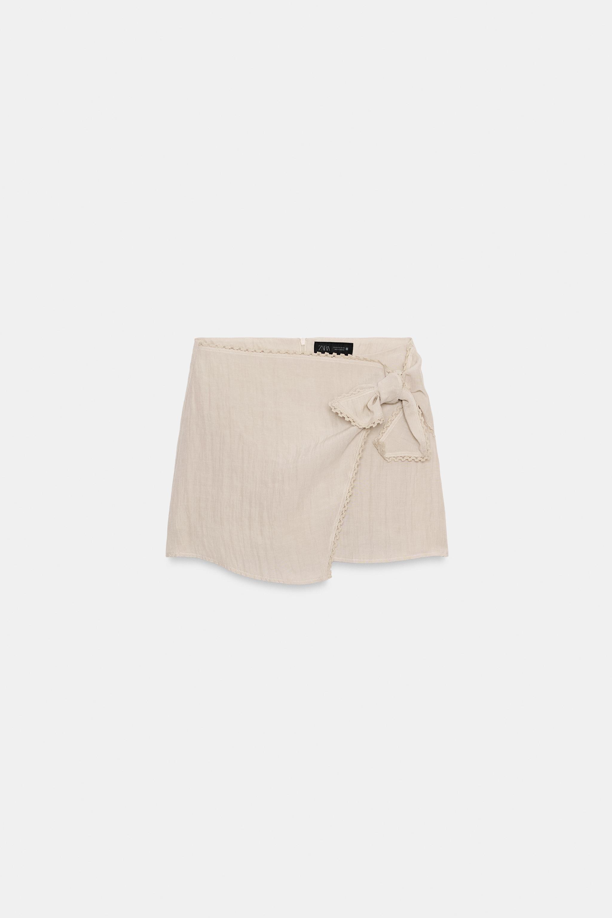 JUPE-PANTALON À NŒUD ET DENTELLE